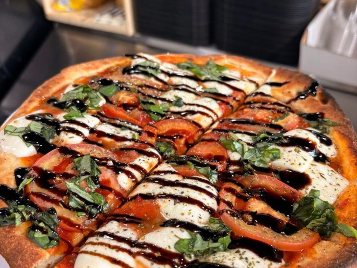 Margherita pizzetta with fresh mozzarella, tomato and balsamic glaze