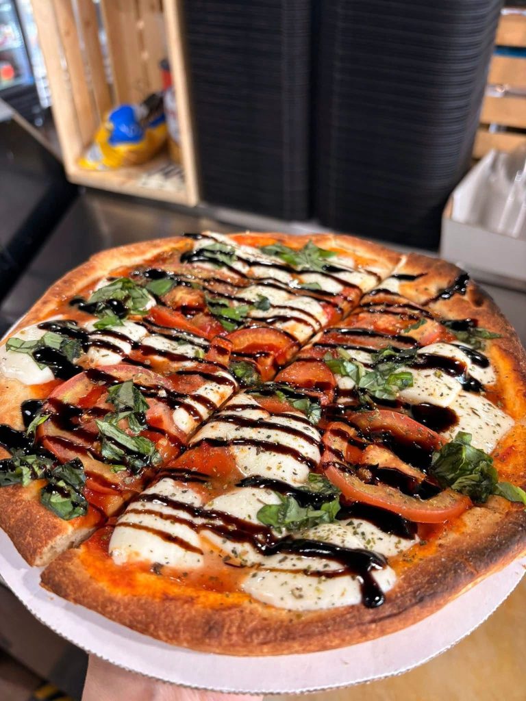 Margherita pizzetta with fresh mozzarella, tomato and balsamic glaze