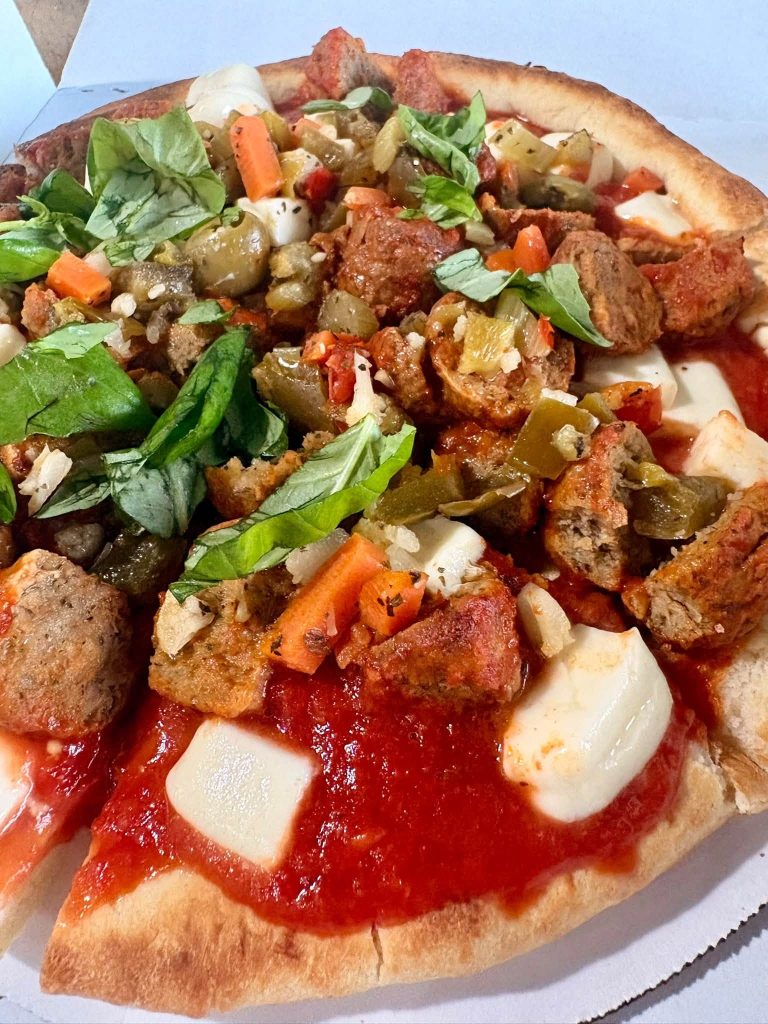 Meatball Park pizzetta with giardiniera and fresh basil