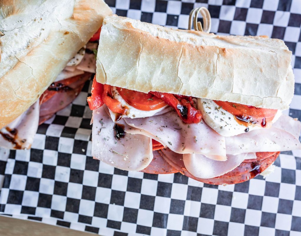 Mortadella Fella sub with fresh mozzarella, roasted red peppers and balsamic glaze