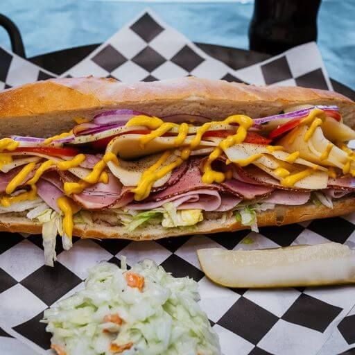 Sub with coleslaw and a pickle